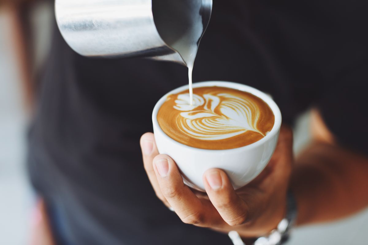 Two cups of coffee representing two different brewing traditions